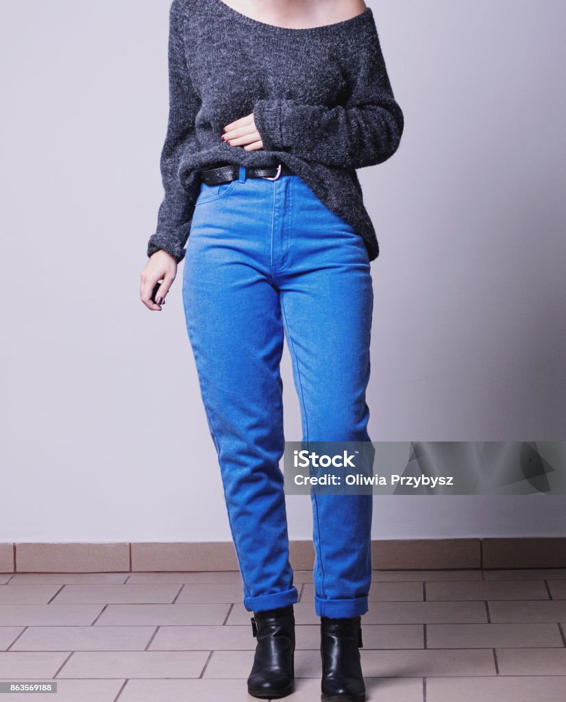 Tilfredsstille indlogering Etablering Womans Fall Winter Fashion Outfit On A Model With Blue Vintage Mom Jeans  And Big Grey Fluffy Sweater Isolated On Grey Background Copy Space Stock  Photo - Download Image Now - iStock