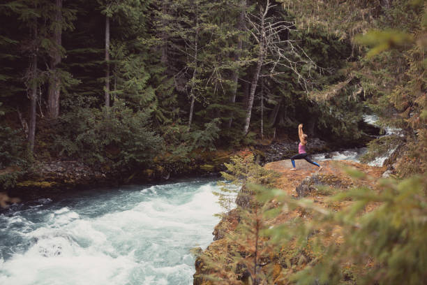 istock Yoga session next to the river 863569456