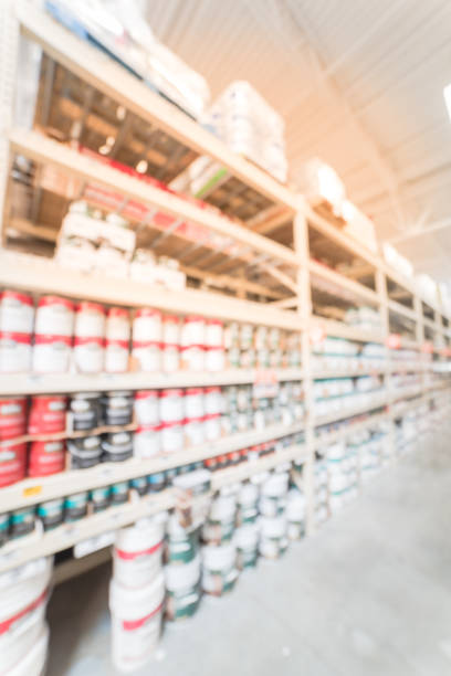 istock Blurred rack of paint cans in home improvement hardware store USA 863572006