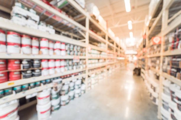 istock Blurred rack of paint cans in home improvement hardware store USA 863572158