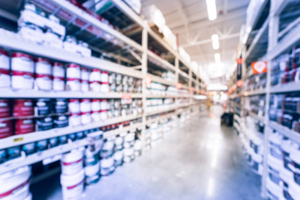 istock Blurred rack of paint cans in home improvement hardware store USA 863572230