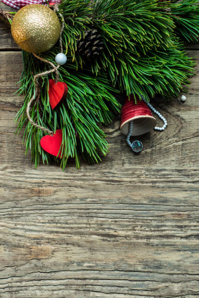 istock Christmas fir tree with decoration on dark wooden board 863572292