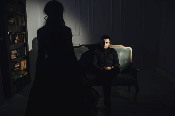 istock woman  with  theatrical mask and handsome man 863587404