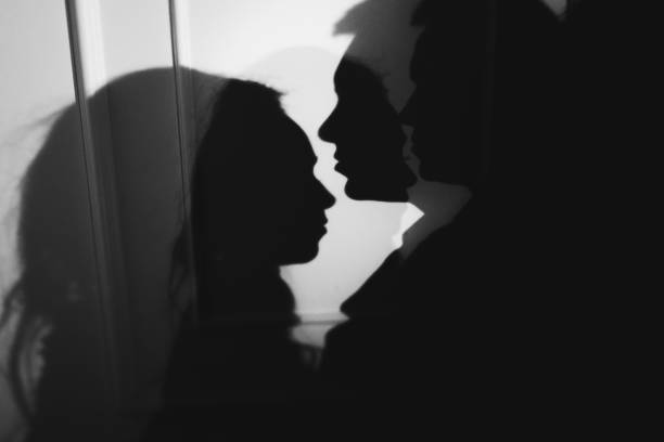 istock woman  with  theatrical mask and handsome man 863587538