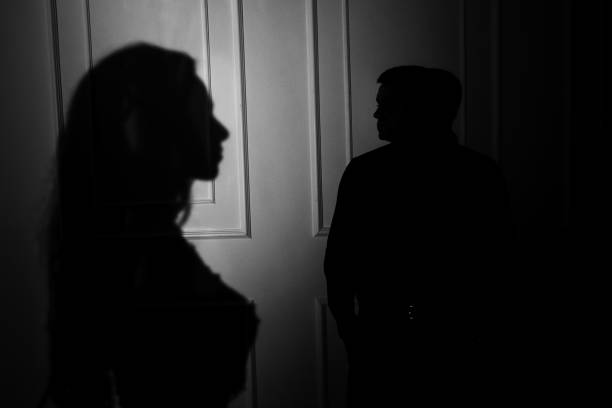 istock woman  with  theatrical mask and handsome man 863587554