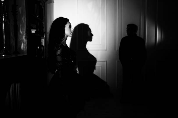 istock woman  with  theatrical mask and handsome man 863589770