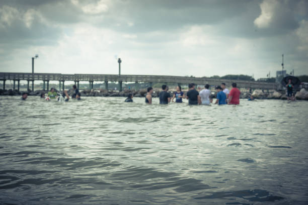 Blurred people on beach La Porte, Texas, USA