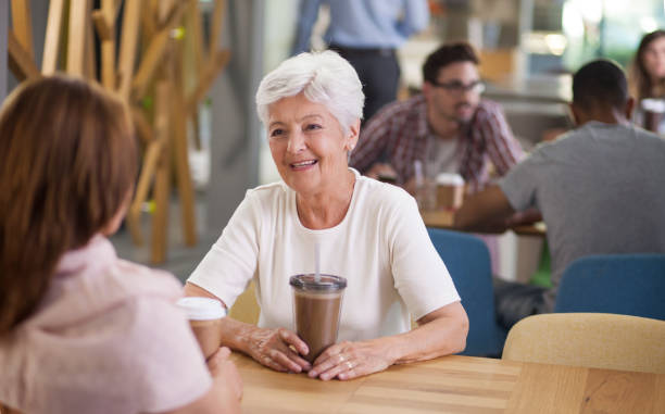 istock Senior woman in caffee shop 863591916