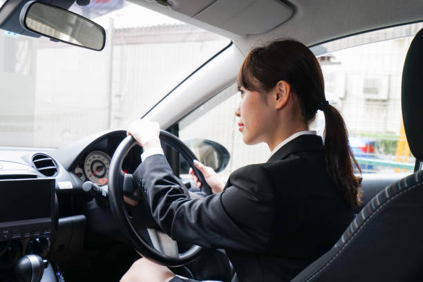 istock Young business woman in car 863592348