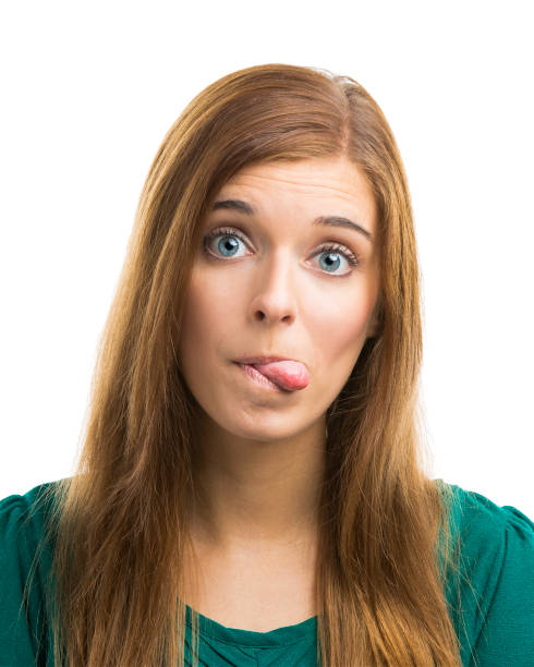 istock Beautiful young woman with a funny face 863596232