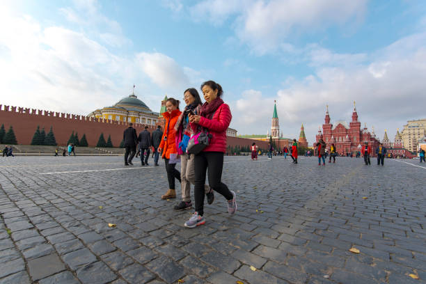Asian tourists at the Red square in Moscow on October 18. 2017 in Russia