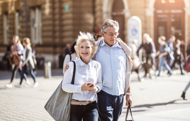 istock Senior Couple Looking Around Old Town 863604458