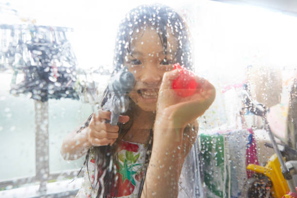 Japanese girl playing with water