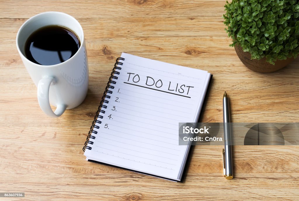 To Do List on Note Pad With Coffee and Pen on Office Desk To Do List, Coffee - Drink, Desk, Plans, Goals, Note Pad To Do List Stock Photo