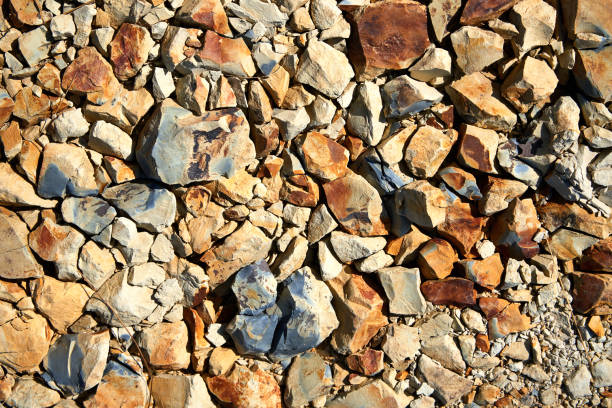 The many of yellow, black and white stones background