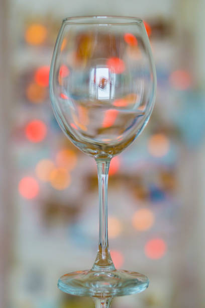 istock Close up an empti  glass for wine  and water on a bokeh background. 863613836