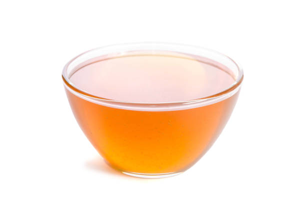 istock honey in the glass bowl  isolated on white background 863620638