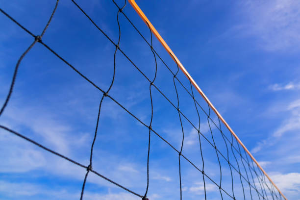 istock Beach volleyball net on the beach with a clear and sunny sky 863620754