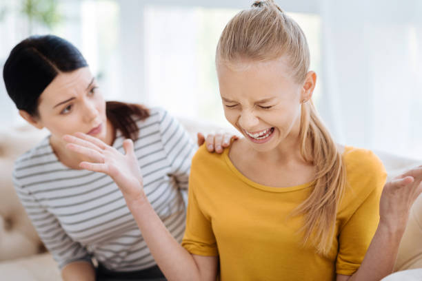 istock Cheerless emotional woman having a nervous breakdown 863621182