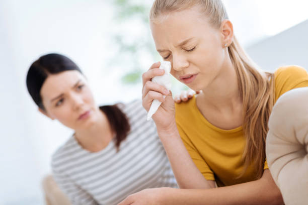 istock Sad gloomy woman holding a paper tissue 863621292