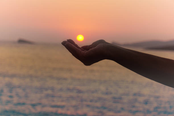 istock The sun in the hand 863621380