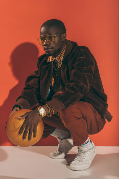 istock stylish man with golden ball 863621798