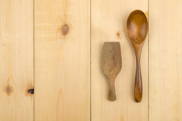 istock Wooden spoon for dessert bakery on the pine table. 863624354