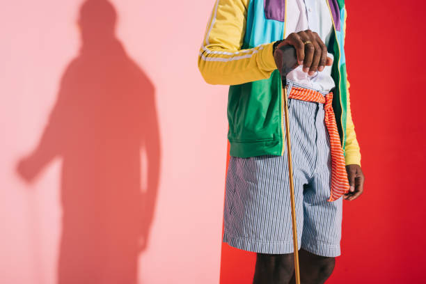 istock stylish man with golf club 863624598
