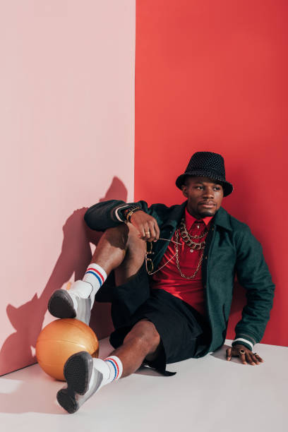 istock stylish man with golden ball 863645830
