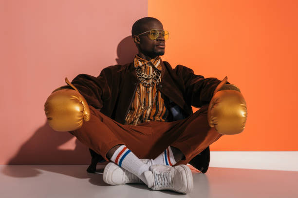 istock stylish man in boxing gloves 863653166