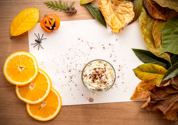 Halloween background with leaves and pumpkins. stock photo