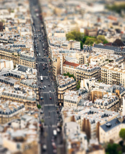 Tilt-shift view over Paris streets A high angle view over the Montparnasse district of central Paris, with a tilt/shift image technique used. tilt shift stock pictures, royalty-free photos & images