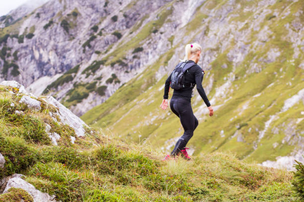 istock Woman running in the mountains 863674252