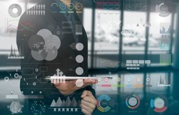 istock business hand holding tablet with data analysis diagram for finance. 863681216