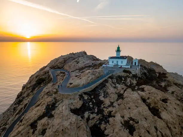 Photo of Aerial view of the Pietra Lighthouse at sunset, Ile-Rousse, Red Island Corsica, Corsica, France