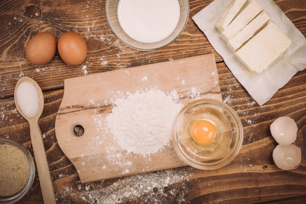 istock Dough recipe ingredients on vintage rural wood kitchen table 863682182