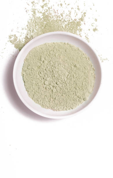 Cosmetic clay powder in the plastic container Cosmetic clay powder in the plastic container green clay stock pictures, royalty-free photos & images