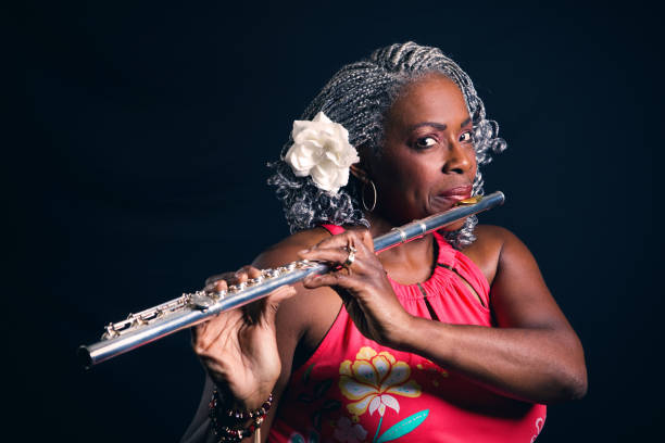 istock Beautiful Woman Playing Flute 863686410