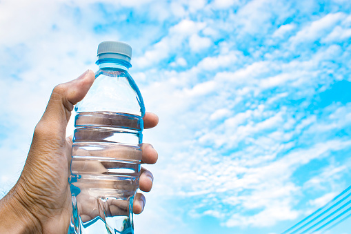 Bottle Water Made To Plastic On Sky Backgroundusing Wallpaper For Package  Or Product Refreshing Image And Copy Space Stock Photo - Download Image Now  - iStock