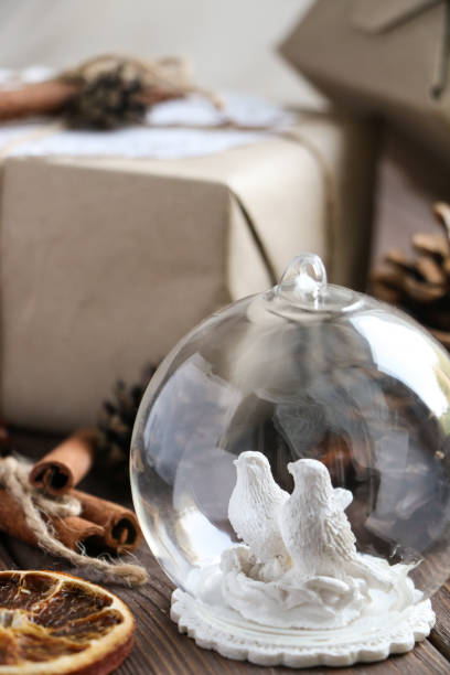 istock white christmas glass toy with birds 863690908