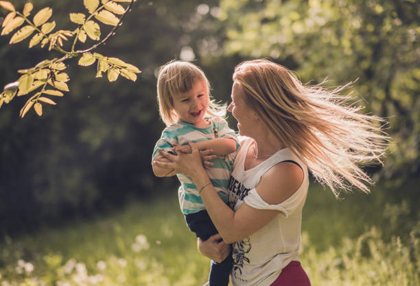 istock plyful mom enjoy her time with a son outdoor 863694264