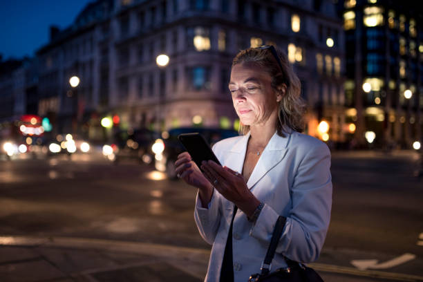 istock Business woman using smart digital tablet in London 863717544