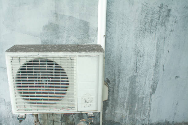 istock Older air conditioning on the wall.Air conditioner compressor 863720644