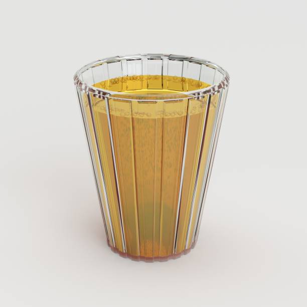 istock 3D Rendered Yellow Liquid Filled Glass Design 863728492