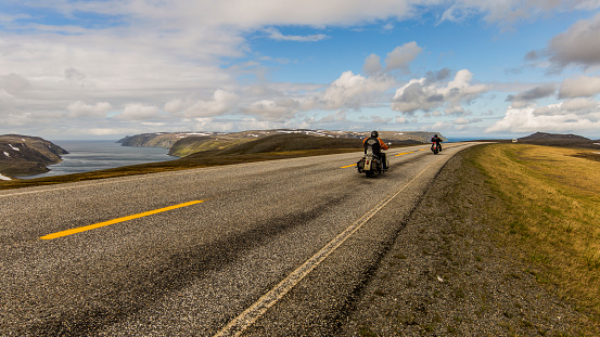 Nordkapp, Norway - July 07, 2017: two Harley Davidson motorcycle bike in the road to Nordkapp, the northest point with road of Europe