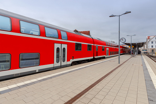 Passenger train near the railway platform in Fussen. Germany. Bavaria.