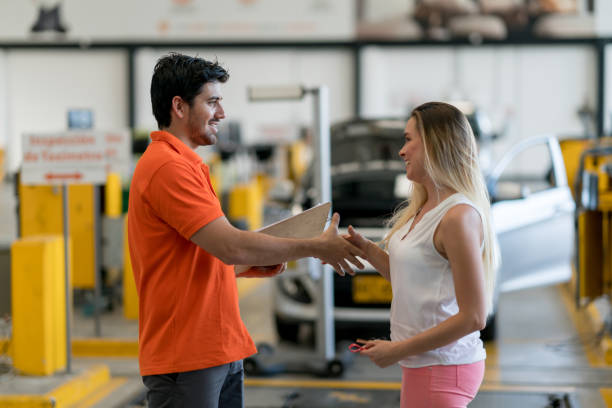 istock Woman taking her broken car to the mechanic 863753232