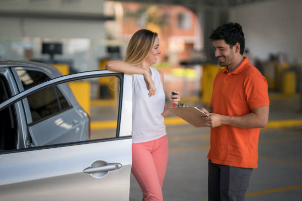 istock Woman taking her broken car to the mechanic 863753246