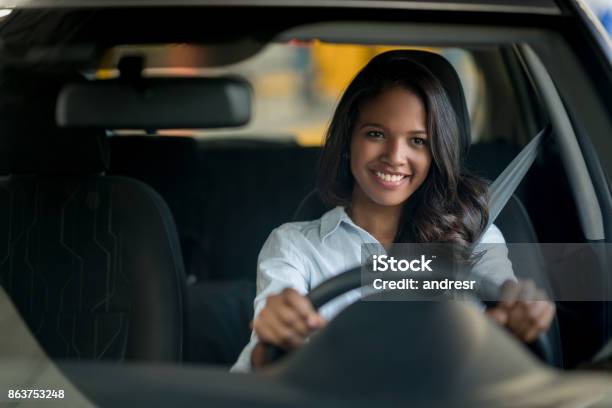 Happy African American Woman Driving A Car Stock Photo - Download Image Now - Driving, Car, Women