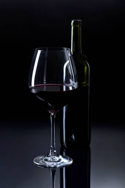 istock Glass and bottle of red wine. 863759742